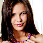 Third pic of Nude Sweet Zelda B takes off her clothes with a smile on her face, and shows off her beautiful, tanned body