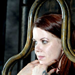 Second pic of SexPreviews - Lila Katt in garter stockings is put in a bdsm cage and exposed in dungeon