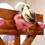 Second pic of EliteSpanking.com - Caned in a Guillotine