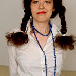 First pic of Horny housewife with pigtails goes crazy on her couch
