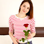 Third pic of This teen loves to make her solo adventures romantic with flowers and the proper setting that helps her ease into masturbation. gallery