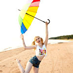 First pic of This petite teen blonde has her perfect little twat ready to have the sexiest beach walk in history. gallery