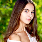 Second pic of Nude Top model Valencia bares her sexy, slender body as she strips in the forest.