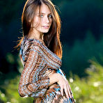 Third pic of Nude Newcomer Dakota Pink shows off her amazing body as she strips outdoors.