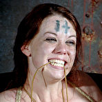 Fourth pic of SexPreviews - Lila Katt is bound with leather cuffs for spanking and toying by lezdom