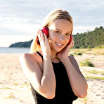 First pic of Agatha delightfully poses at the beach as she bares her amazing titties. - Hotnudegf.com