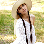 First pic of Brunette posing outdoors