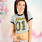 Third pic of Hottest Extremely sexy skinny and sexy brunette teen model starts to slowly undress and show us her small boobies. by ShavedTeenGirls.com