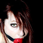 Third pic of SexPreviews - Emily Marilyn redhead rope bound with red ballgag in black stockings and high heels
