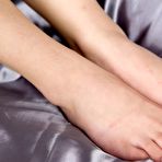 Fourth pic of Luna Kobayashi spreads her soft legs, fingers herself, gets a guy to cum on her feet