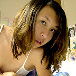 First pic of Skinny Thai girl getting naked in her bedroom