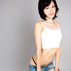 Fourth pic of Ravishing Ryo Yuuki posing with her legs high up on the bed, she's too hot