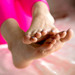 Fourth pic of Pantyhose teen Mizuki poses on all fours with a vibrator pleasuring her pussy