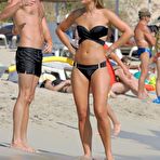 Fourth pic of Vogue Williams in black bikini on a beach