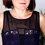 First pic of Brunette milf Meredith Johnson has a wonderful shaved cunt to pack with big dildo