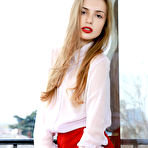 First pic of Elle Tan Leggy Girl in a Red Miniskirt