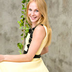 First pic of Runa plays on the swing as she bares her sweet pussy. naked