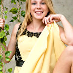 Fourth pic of Runa plays on the swing as she bares her sweet pussy. naked