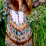 First pic of Seductive dress brunette revealing her smooth pussy in tall grass - aMetart.com