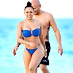 Fourth pic of Melanie Brown in blue bikini on a beach