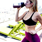 Second pic of Blonde hottie Maria Doroshina posing in yoga pants and workout shorts