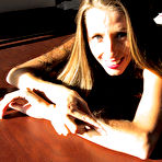 First pic of Cute long haired clothed lady Lori Anderson demonstrates her long arm hair