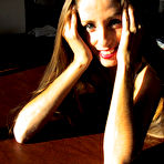 Third pic of Cute long haired clothed lady Lori Anderson demonstrates her long arm hair