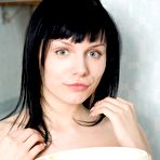 First pic of Elegant brunette chick with smoking hot curves Anna Ac gets naked in softcore photos