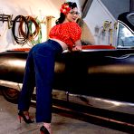 First pic of Otto shares easy brunette Maggie Mayhem with his co-worker in the garage