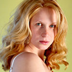 Third pic of Admirable teen with a tattoo on her stomach undressing and playing with dildo on the floor. free pictures