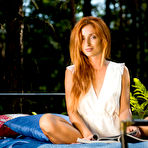First pic of Alluring Michelle H shows off her lusty body in the woods.