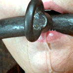 Third pic of SexPreviews - Ashley Graham busty brunette is bound in metal her naked body exposed