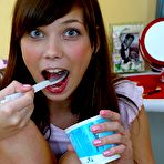 First pic of Just to make some fun this cute girl reveals her pussy and covers her body with cream. free pictures
