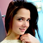 First pic of Lusty brunette teen in striped socks Kamilah A is playing her legs and showing shaved nub