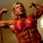 First pic of Topless middle-aged bodybuilder Lauren Powers shows off her hard muscles and big tits