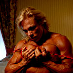 Third pic of Topless middle-aged bodybuilder Lauren Powers shows off her hard muscles and big tits