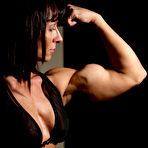 Fourth pic of Strong dark haired woman Carrie SheMuscleGym in black bikini shows off her firm muscles