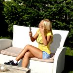 First pic of Cute teen blonde Nikky Thorne gets nude in the garden and toys her gash with a toy