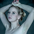 Fourth pic of SexPreviews - Alani Pi petite blonde is bound in metal her ass spanked in dungeon