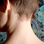 Fourth pic of Riley yanks her pink hairy pussy open.