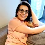 First pic of Chubby brunette Chasey Devil poses nude on the couch - Anilos Porn Pics