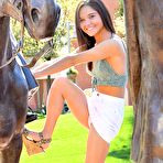 Fourth pic of Long-legged Zoe FTV goes riding in a tiny skirt - FTV Girls Pics