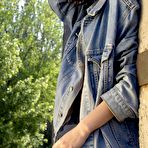 First pic of Naughty brunette doll Eleonora B strips and has fun outdoors pouring water on her nude body