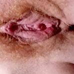 Third pic of Ginger wife rubbing her hairy freh fucked pussy at AmateurPorn.me