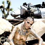 First pic of Young and shaved Leigh Raven posing and playing with chains