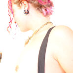 Third pic of Tattooed redhead Amanda Kitten gets naked and fucks herself with glass dildo on webcam