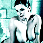 Fourth pic of Big titted alt model Alsana Sin poses in Halloween hat with skull in hands