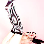 Fourth pic of Tattooed goth girl with lollipop Kellie Laplegua strips to show her pierced pussy and tits