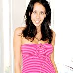 First pic of Orgasm craving brunette Nikki Brooks licks the dildo and slides it into the nub