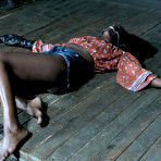 Third pic of SexPreviews - Bellah Dahl curly ebony in leather is spread bound for spanking in dungeon